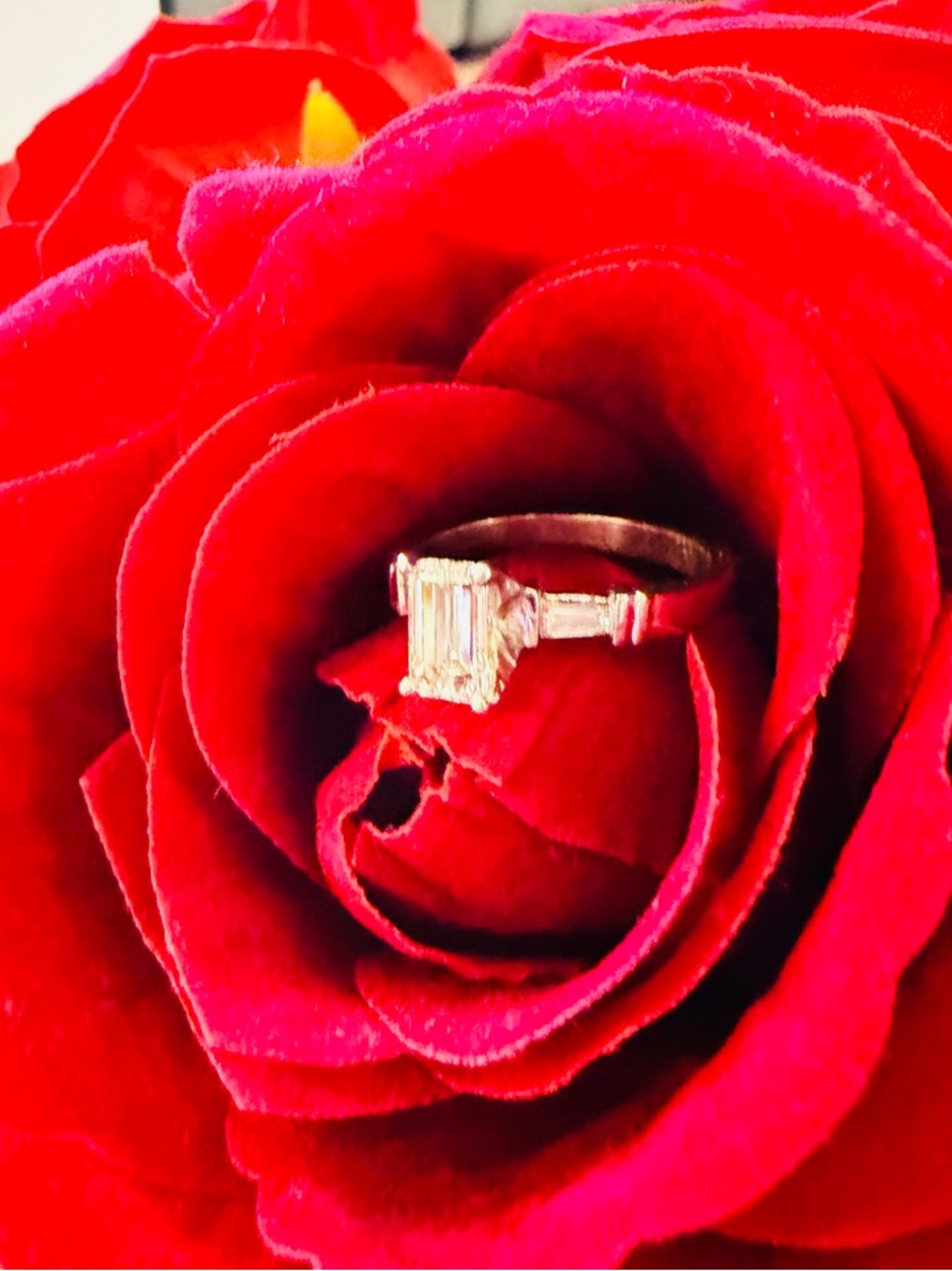 Emerald cut diamond ring